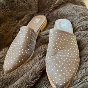 Never worn! Flat heel! Size 11 suede like material with silver metallic balls.